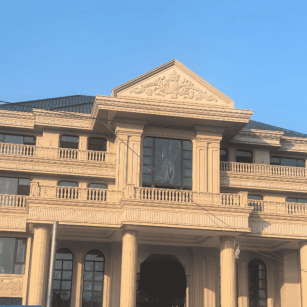 武汉黄金麻别墅外墙干挂石材效果示例