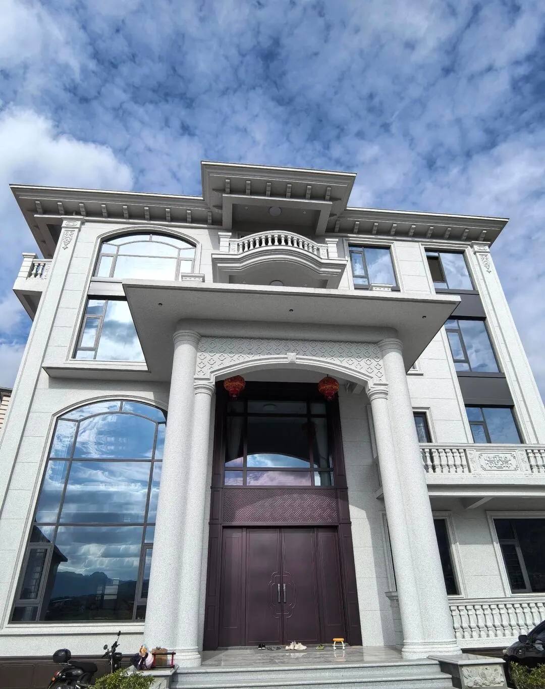 武汉白麻别墅外墙干挂石材效果示例